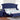 Alzir Button Tufted Bed in Blue. This chic Alzir button tufted bed comforts cushioned velvet-like fabric. It has a glamorous wingback headboard and framing nailhead trim dazzles.